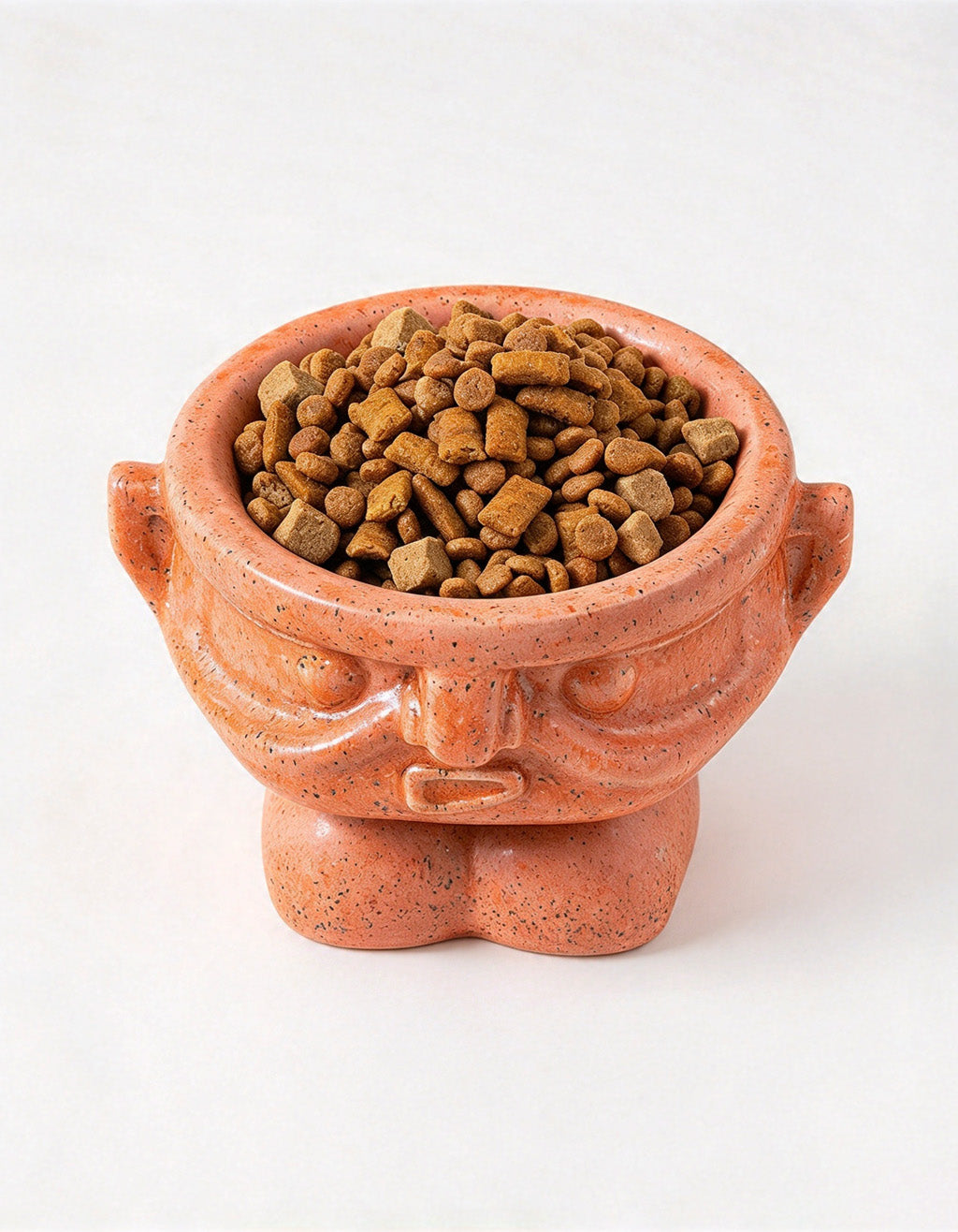Elevated ceramic pet bowl in kiln-fired orange inspired by Sanxingdui mask design, supporting neck health for cats and dogs