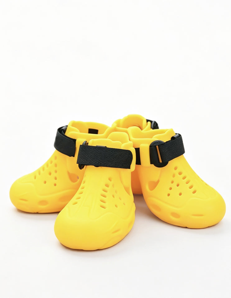 Yellow Chisu AeroFlex dog sandals with a breathable hollow design for outdoor use