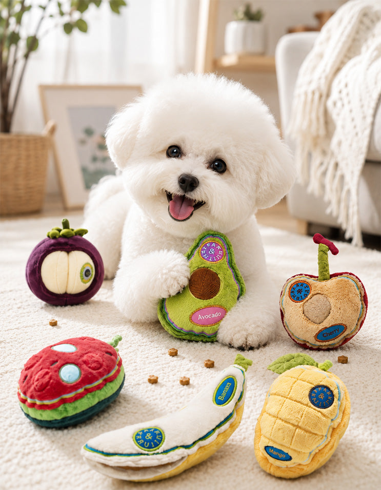 Small dog playing with fruit-themed enrichment toys designed for sniffing and stress relief