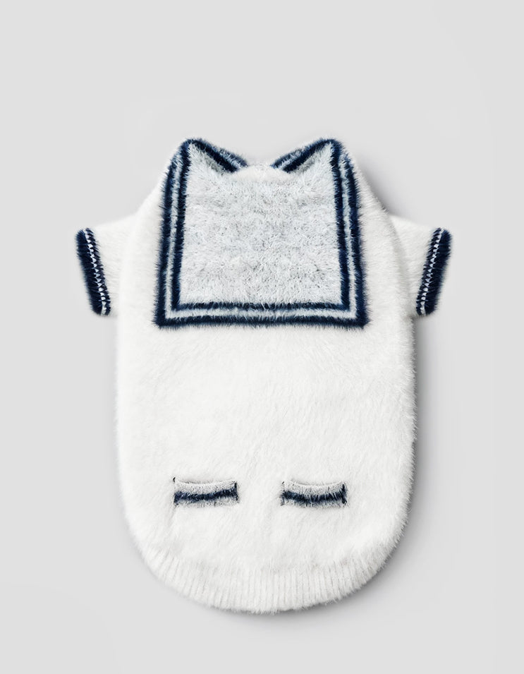 Close-up of the white mink knit dog cardigan highlighting the soft texture and sailor collar.