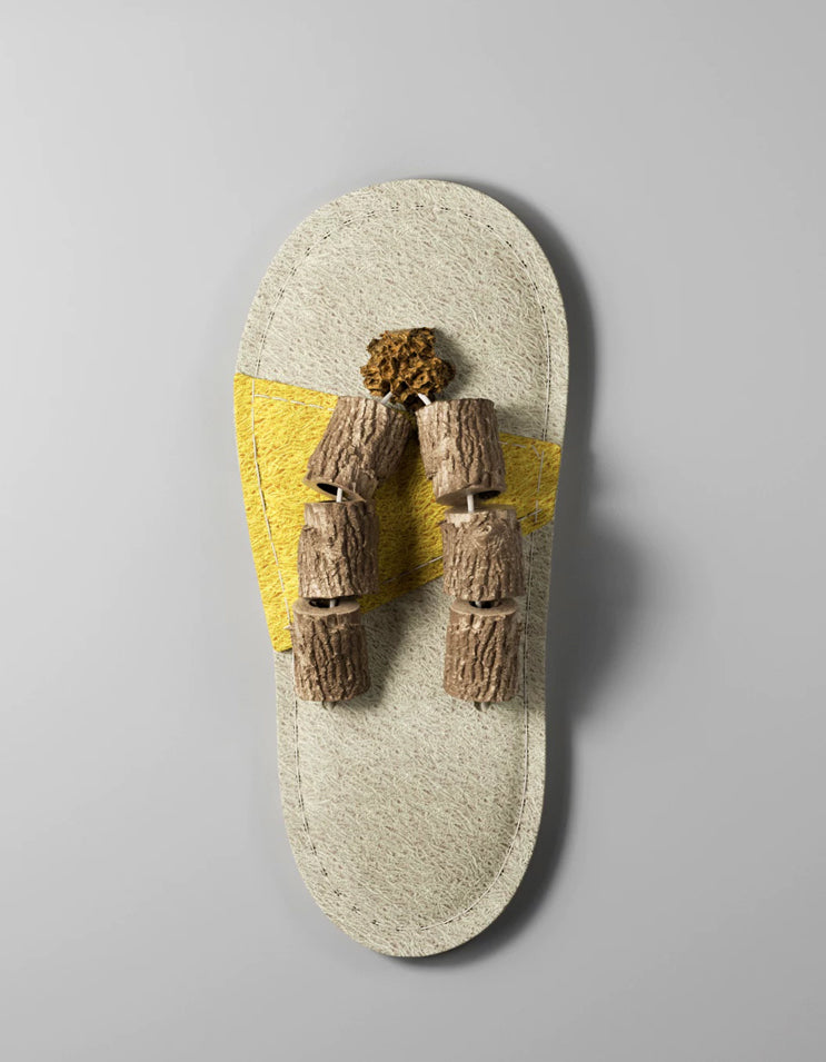 White and yellow cat slipper luffa chew toy with silver vine
