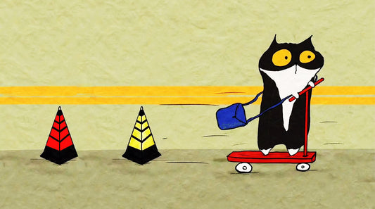 A cute small kitten standing on a mini scooter in a park, representing safe outdoor cat exploration and mental stimulation.