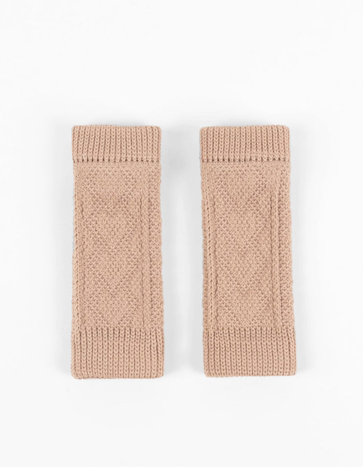Beige dog joint sleeve with flexible compression that helps protect knees and elbows without restricting movement.