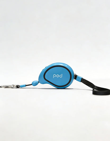 Close-up of blue mango-shaped retractable leash with smooth casing and compact size