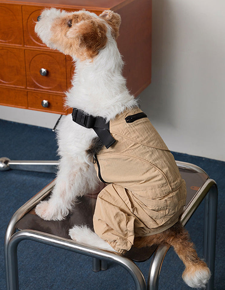 Dog wearing CHISU SunTrail lightweight dog coveralls in brown for outdoor comfort and protection.