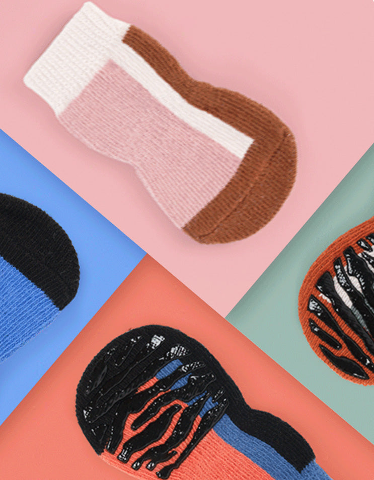 CloudGrip non-slip dog socks in Sakura Pink, Orange, Mist Green and Sky Blue made with combed long-staple cotton and full-sole grip.