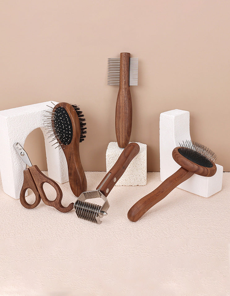 Full set of wooden cat grooming tools including nail clipper, slicker brush, comb, dematting tool and flea comb