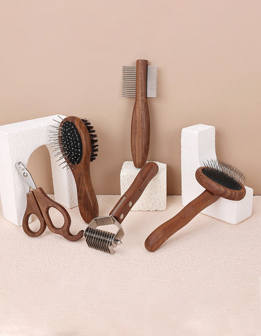 Full set of wooden cat grooming tools including nail clipper, slicker brush, comb, dematting tool and flea comb
