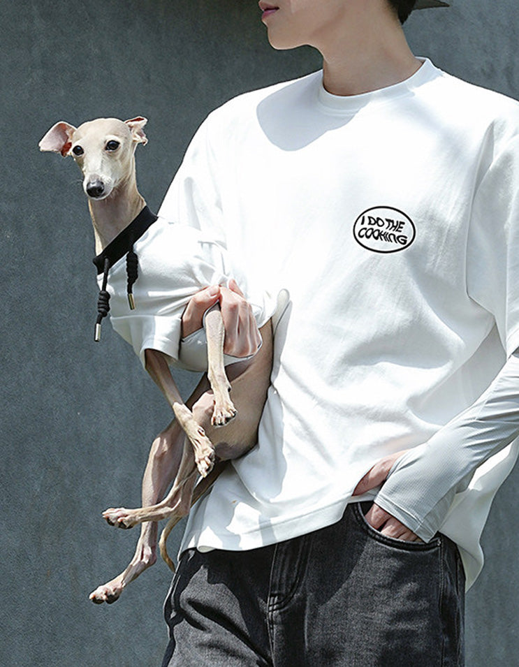 Owner and dog sharing a special moment while wearing matching pet and owner cotton shirts