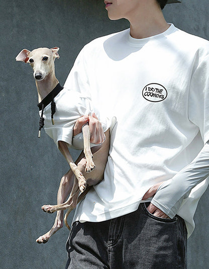 Owner and dog sharing a special moment while wearing matching pet and owner cotton shirts