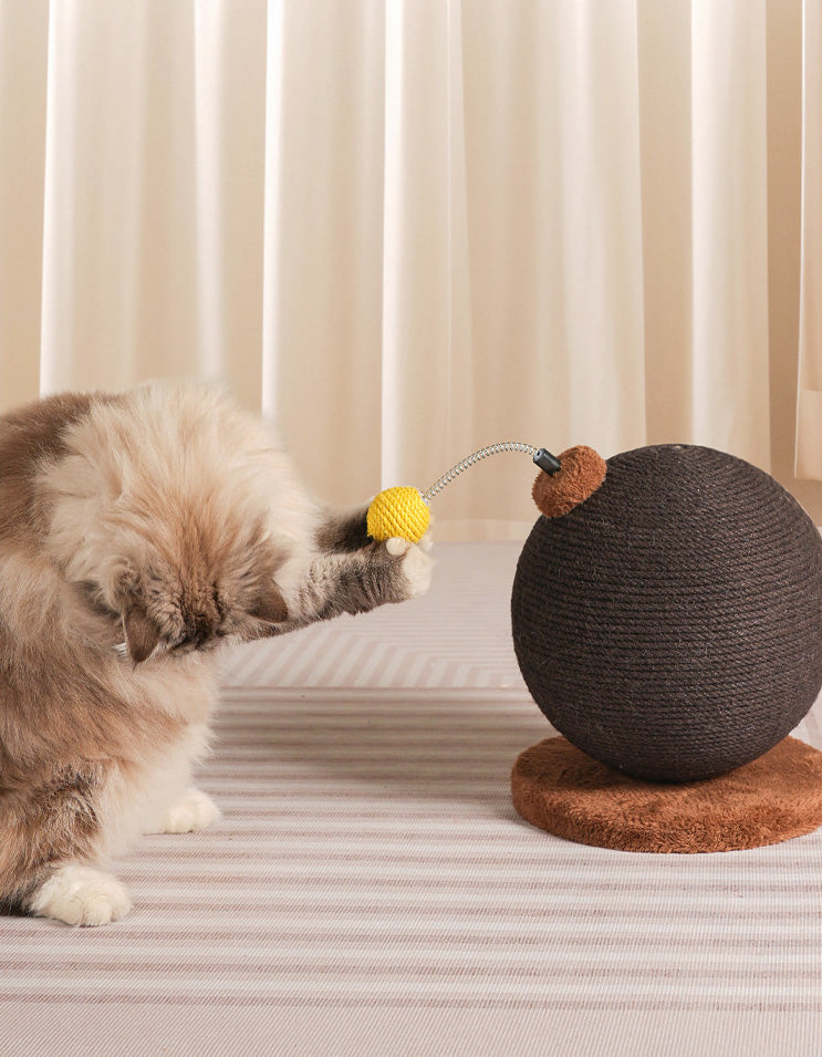 Cat stretching and scratching on playful shaped scratching post toy