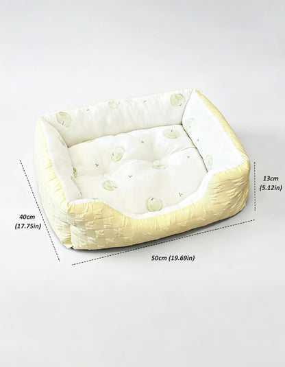 Green apple shaped cooling pet bed featuring soft PP cotton filling and a non-slip bottom