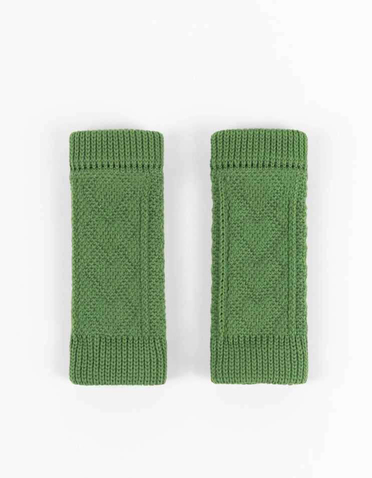 Green compression sleeve for dogs providing lightweight joint support during walks, play, and recovery.