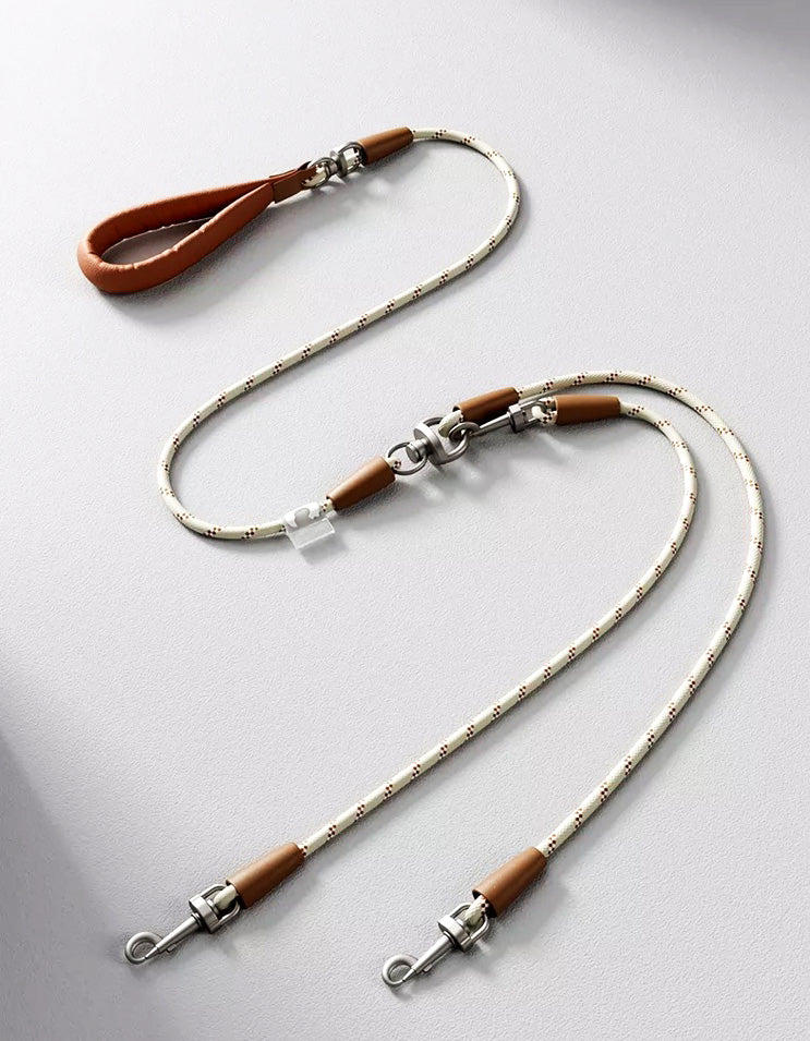 Close-up of leather handle on dual dog leash for comfortable and secure grip