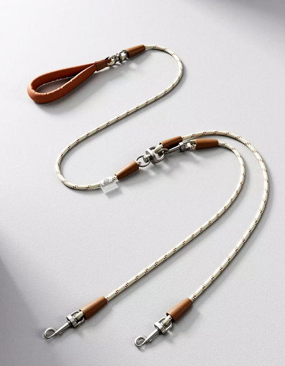 Close-up of leather handle on dual dog leash for comfortable and secure grip