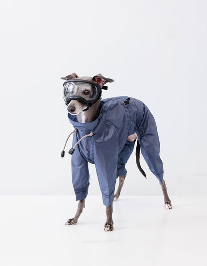 Blue CHISU AeroShield dog rain shell made from ultra-light nylon for outdoor weather protection.