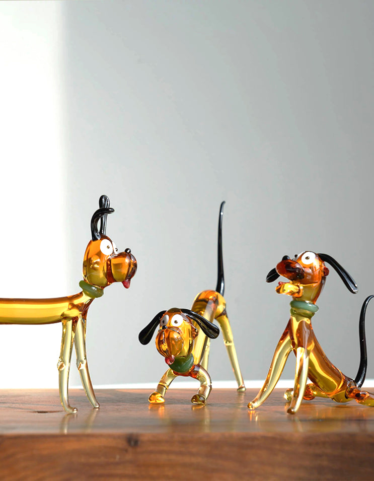 Cute trio of liuli glass dog figurines in standing, play bow, and sitting poses, perfect decorative collection