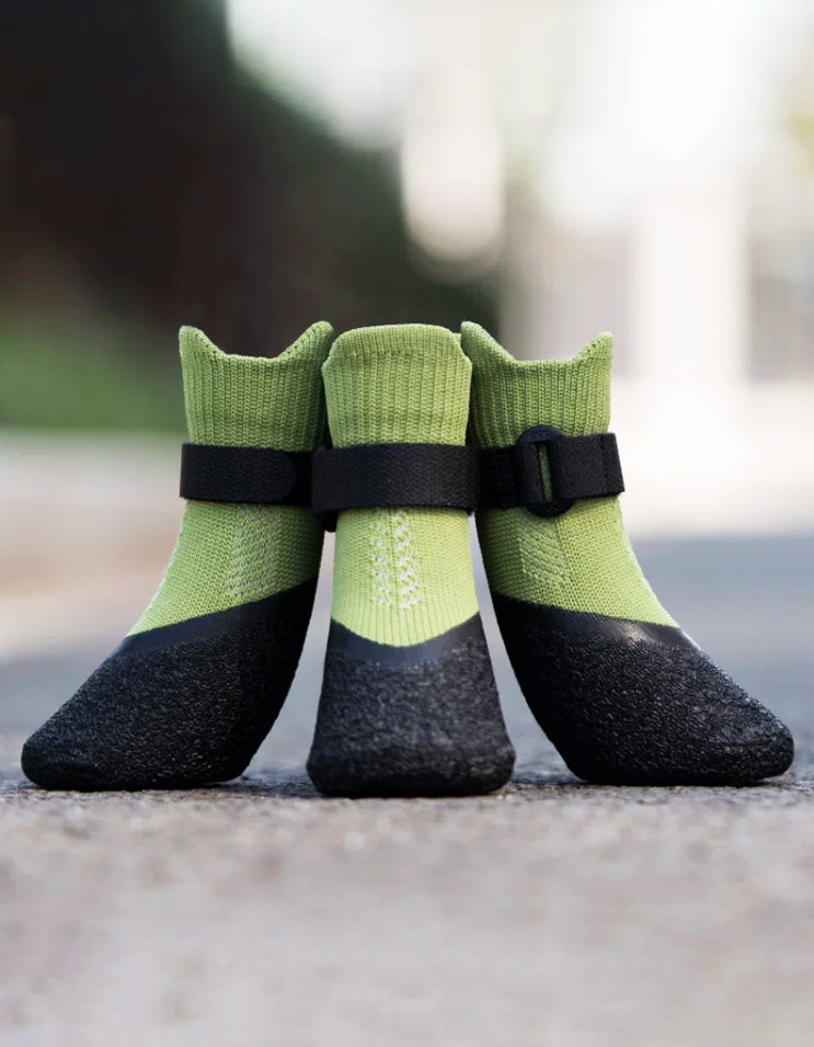 Green performance dog boots designed for running, training and outdoor walks