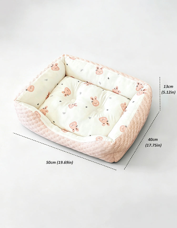 Pink rabbit shaped cooling pet bed with soft textured fabric and cushioned PP cotton fillin