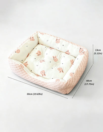 Pink rabbit shaped cooling pet bed with soft textured fabric and cushioned PP cotton fillin