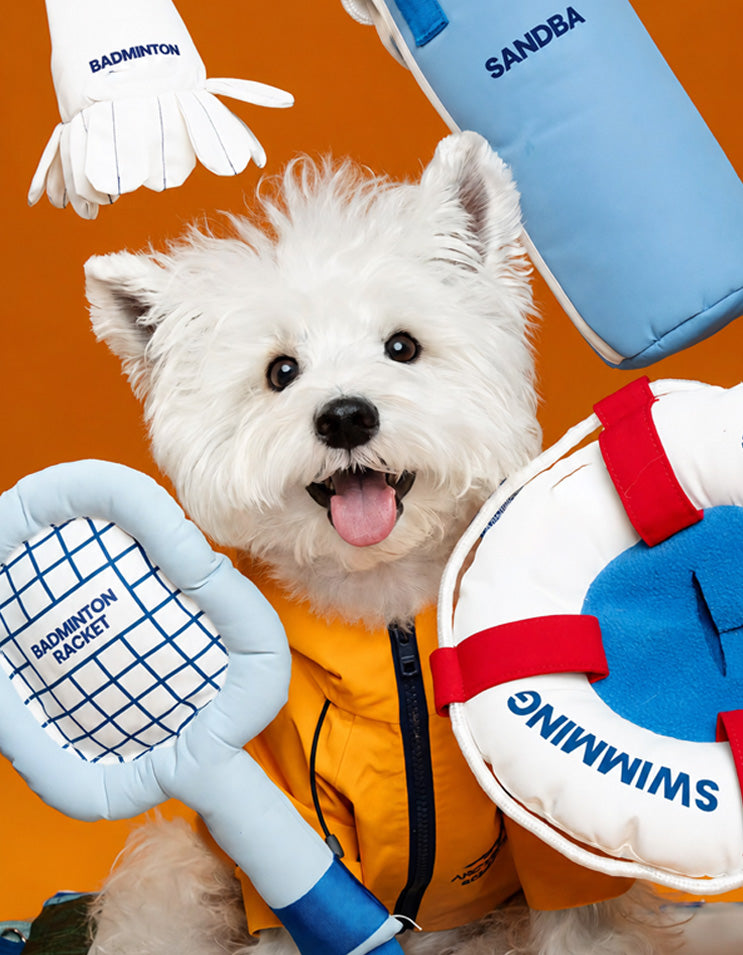 Active dog using enrichment toy for sniffing and treat discovery during indoor play