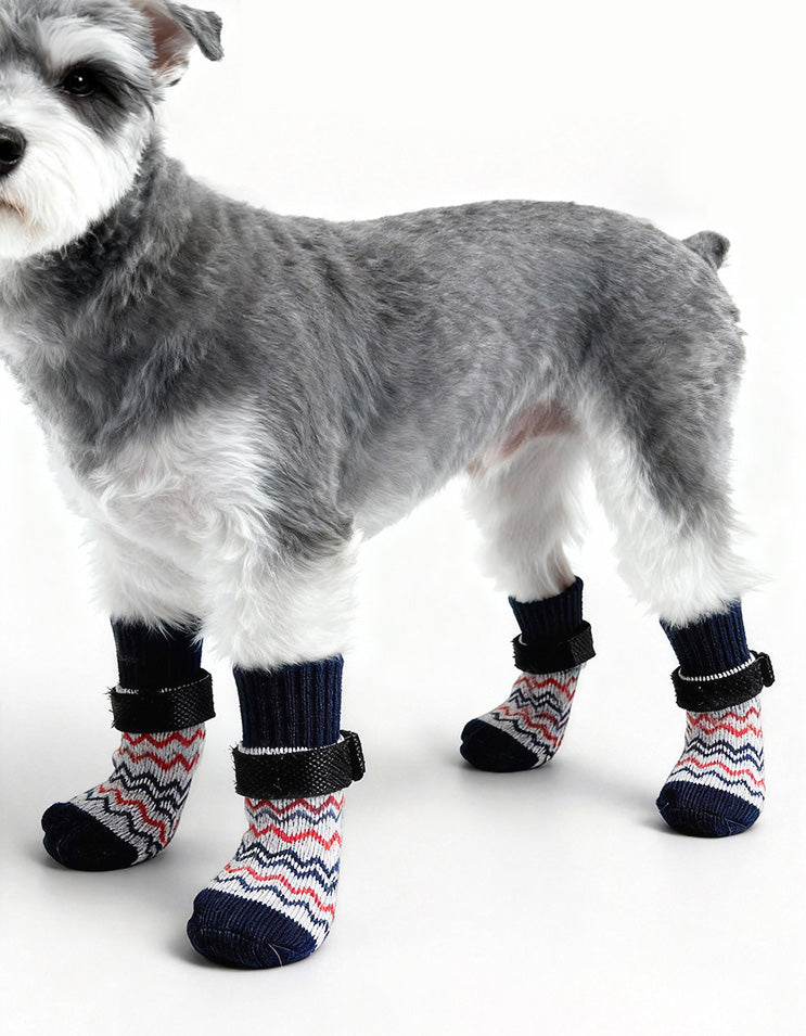 Dog wearing WarmStay extended non-slip dog socks with cotton knit fabric, grip sole, and secure strap design for indoor comfort.