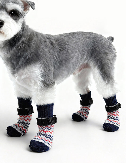 Dog wearing WarmStay extended non-slip dog socks with cotton knit fabric, grip sole, and secure strap design for indoor comfort.