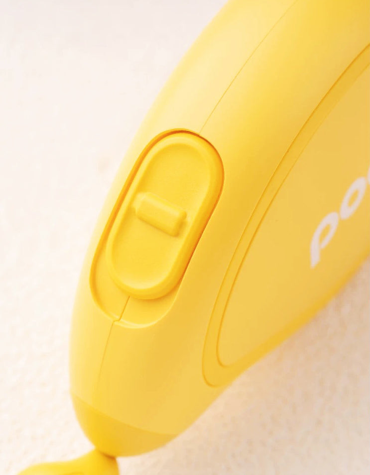 Detailed view of yellow mini retractable leash with ergonomic grip for small pets